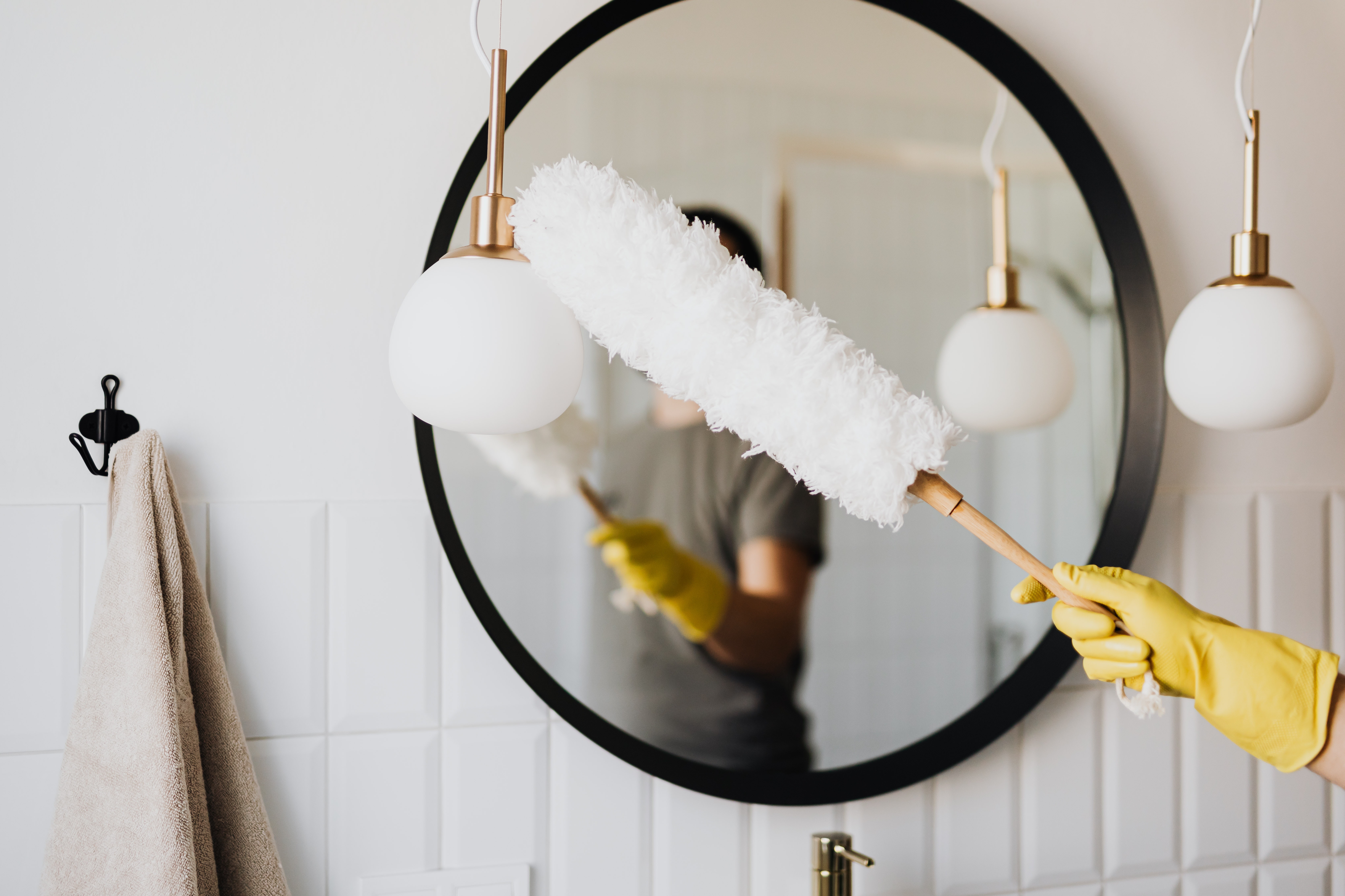 Feather Duster on Glass Surface Maintaining Glass Flooring