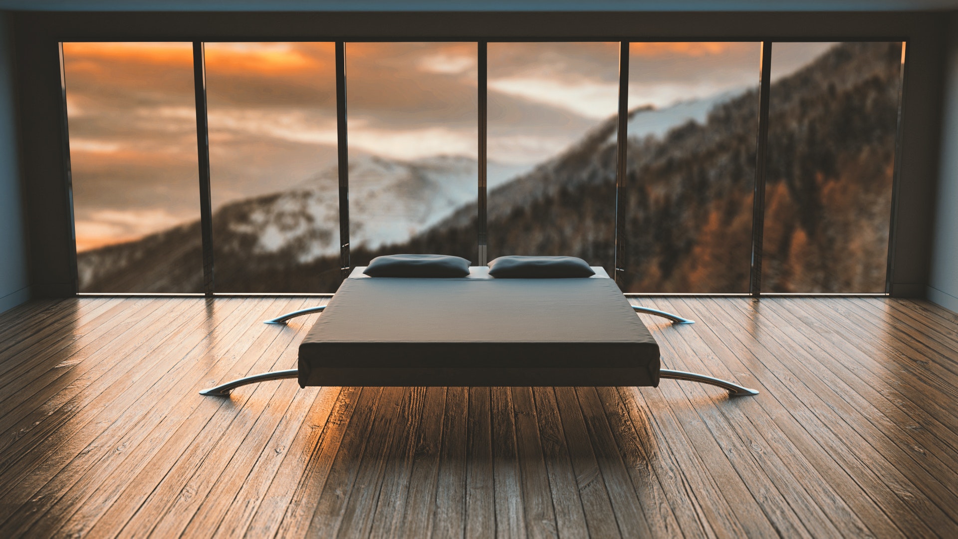 hotel room with floor to ceiling windows overlooking the mountains